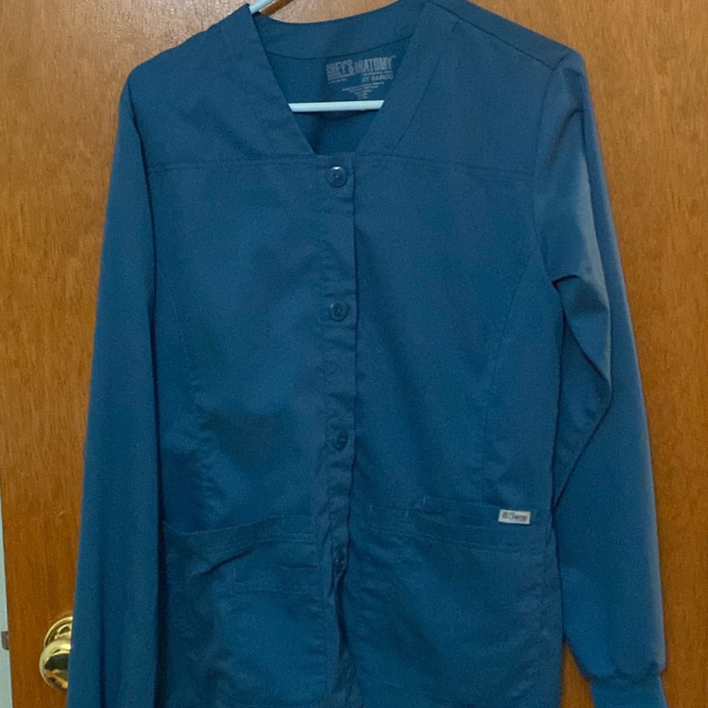 Carribean blue scrub top with buttons size medium